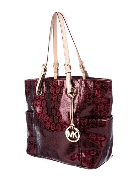 michael kors bags are leather|Michael Kors leather handbag.